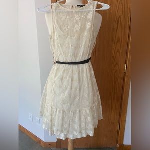 Boutique dress. Tan/crème color. Never worn but I did remove the tags.